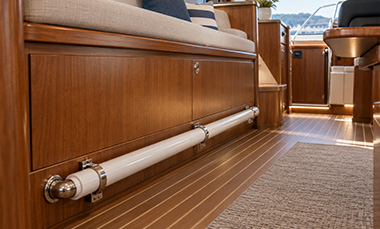 Interior of a yacht showing a custom implementation of electrical wiring and fixtures.
